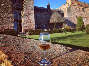 Islay whisky in front of a castle